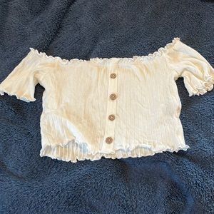 very cropped white off the shoulder top